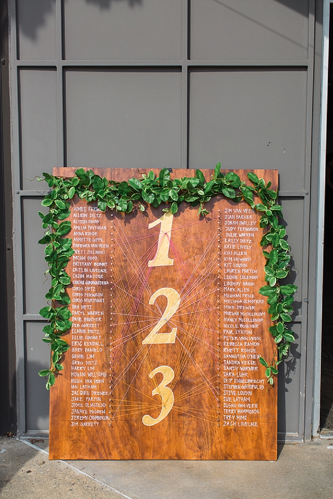 Check out this AMAZING handmade seating chart!! We're in LOVE!
