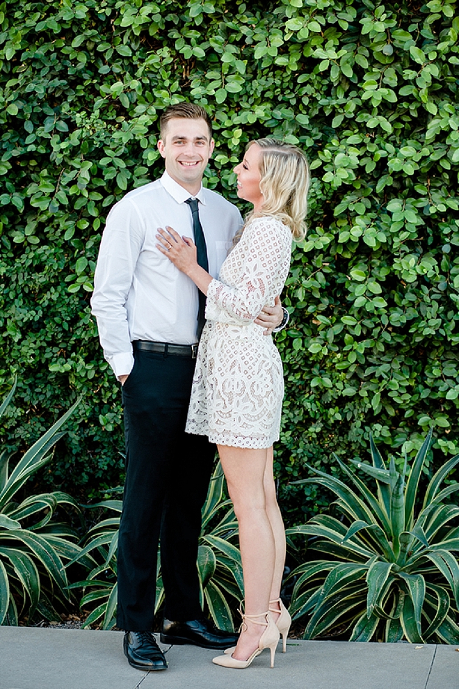 There's nothing more gorgeous than a couple in love in front of a gorgeous greenery wall!