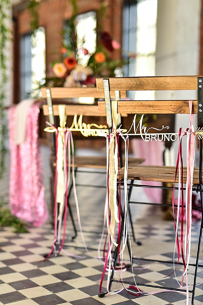 We're in LOVE with these gorgeous custom wooden chair hangers for the bride and groom!