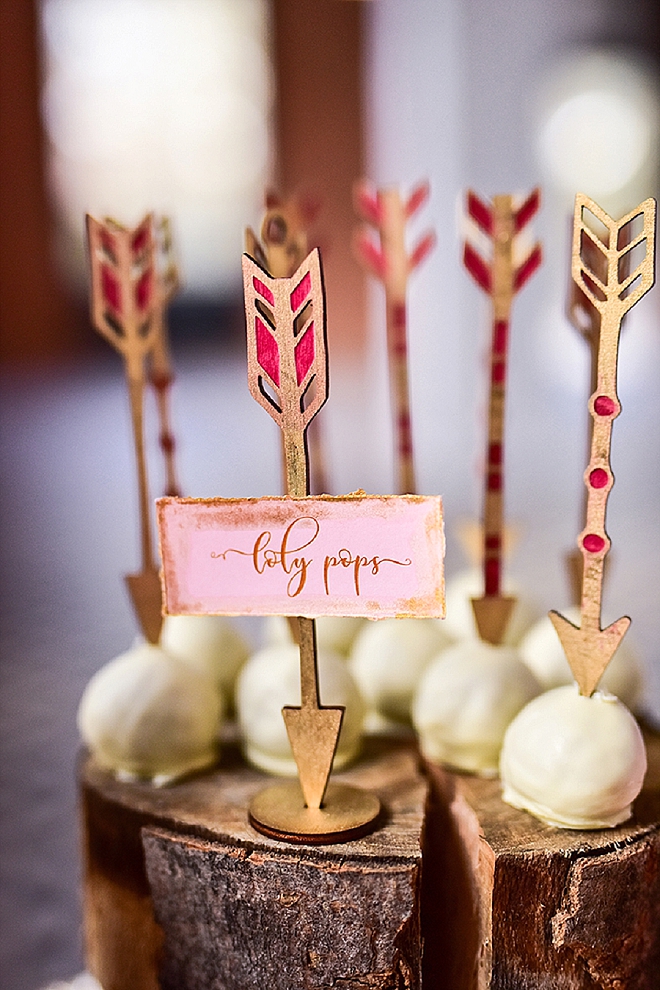 We're swooning over this super glam dessert table with customized wooden accents!