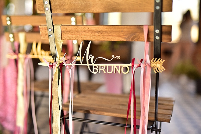 We're in LOVE with these gorgeous custom wooden chair hangers for the bride and groom!