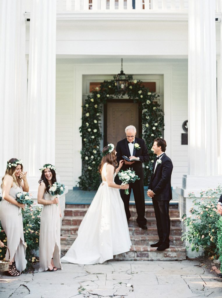 Pretty floral crowns, white flowers, and neutral bridesmaid dresses. 