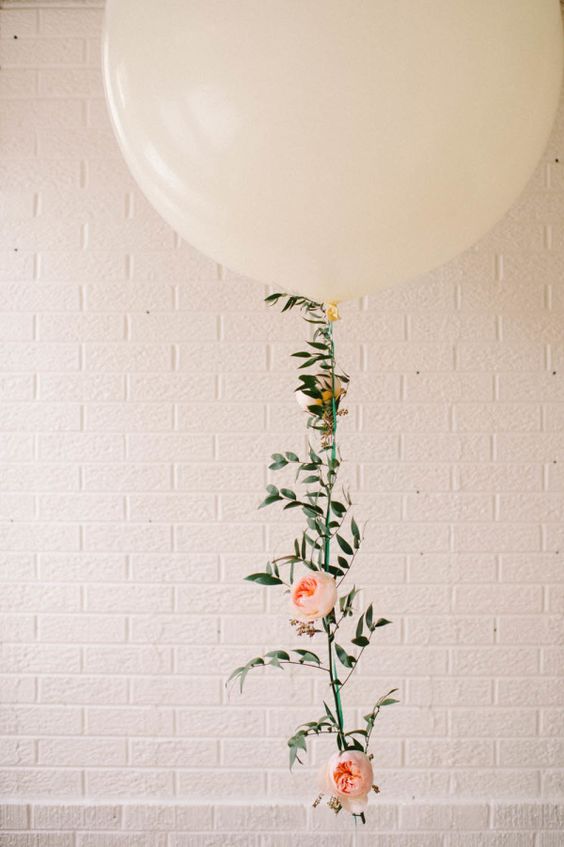 Floral balloon garland - so pretty and feminine. I could see this at a party or wedding!