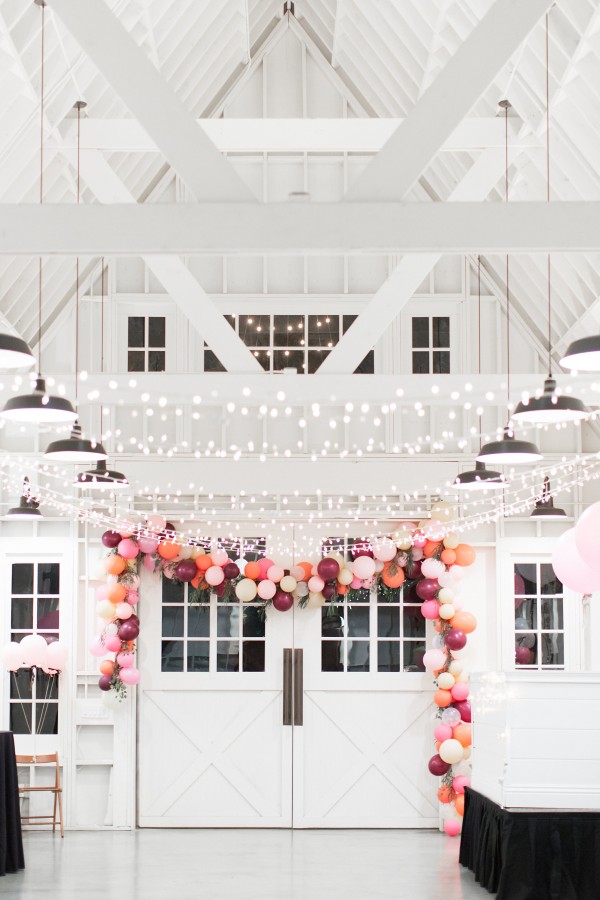 This balloon arch is so gorgeous! Soft pastels and jewel tone colors. 