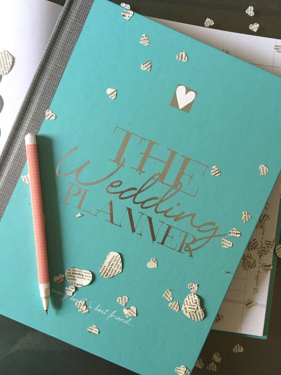 Don't forget a gorgeous wedding planning notebook!