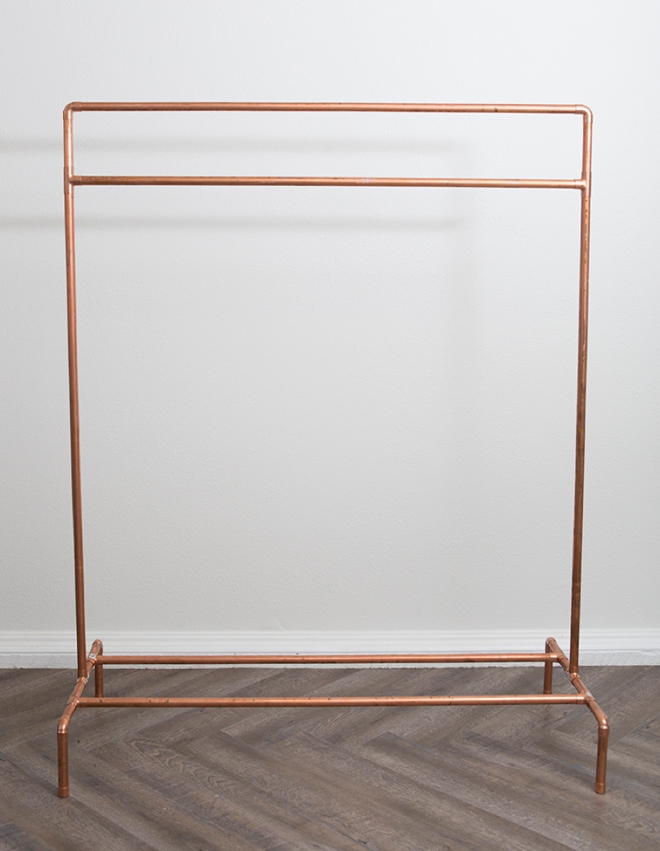 This DIY copper pipe wardrobe stand is AMAZING