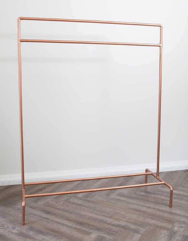 This DIY copper pipe wardrobe stand is AMAZING