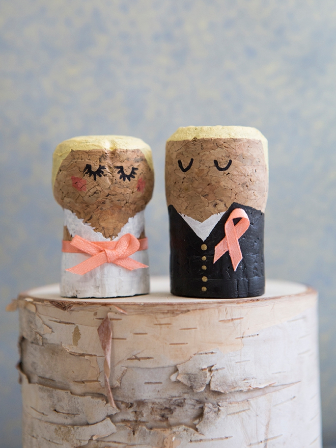 OMG, these DIY champagne cork bride and groom cake toppers are the cutest thing ever!