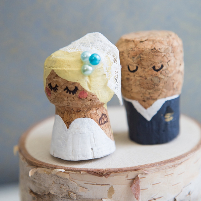 OMG, these DIY champagne cork bride and groom cake toppers are the cutest thing ever!