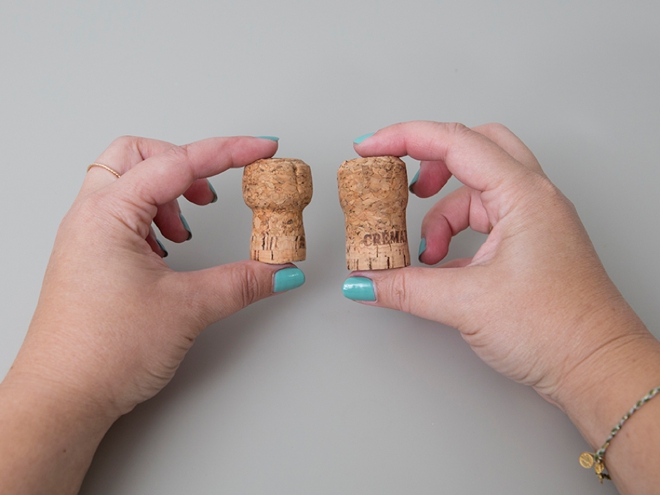 OMG, these DIY champagne cork bride and groom cake toppers are the cutest thing ever!