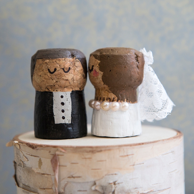 OMG, these DIY champagne cork bride and groom cake toppers are the cutest thing ever!