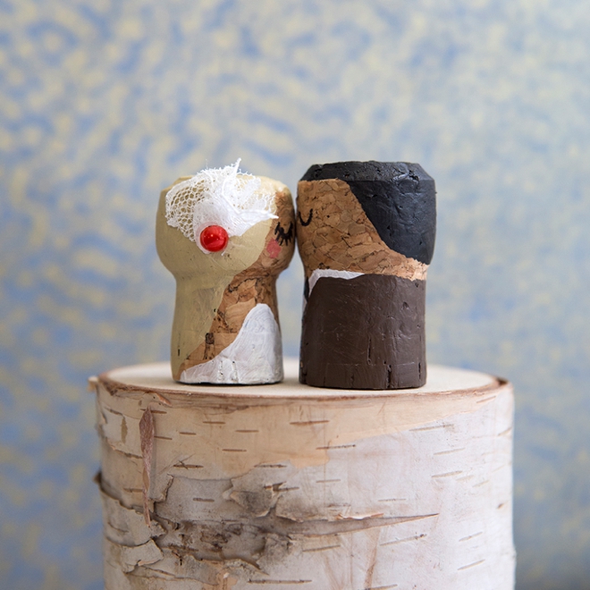 OMG, these DIY champagne cork bride and groom cake toppers are the cutest thing ever!