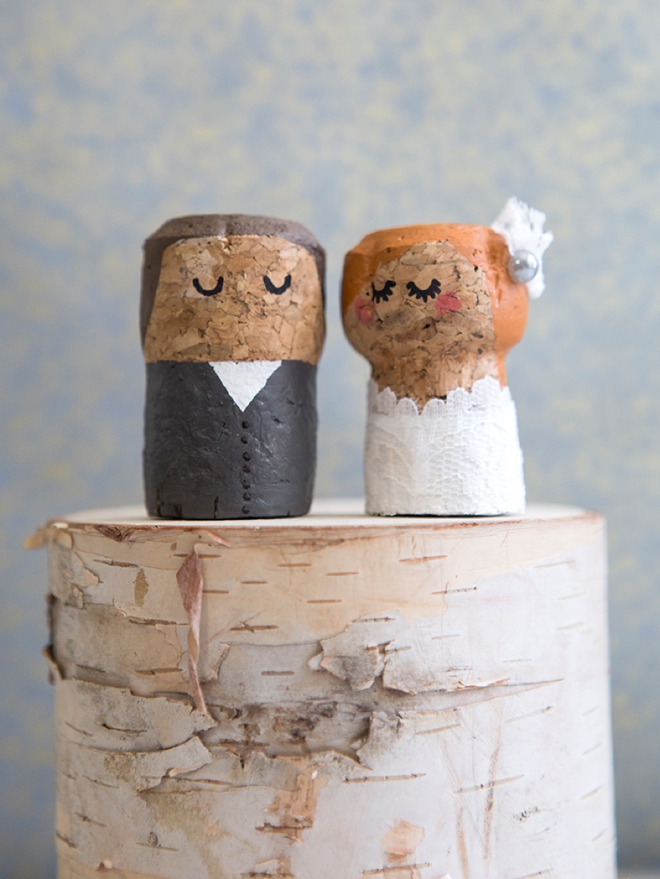 OMG, these DIY champagne cork bride and groom cake toppers are the cutest thing ever!
