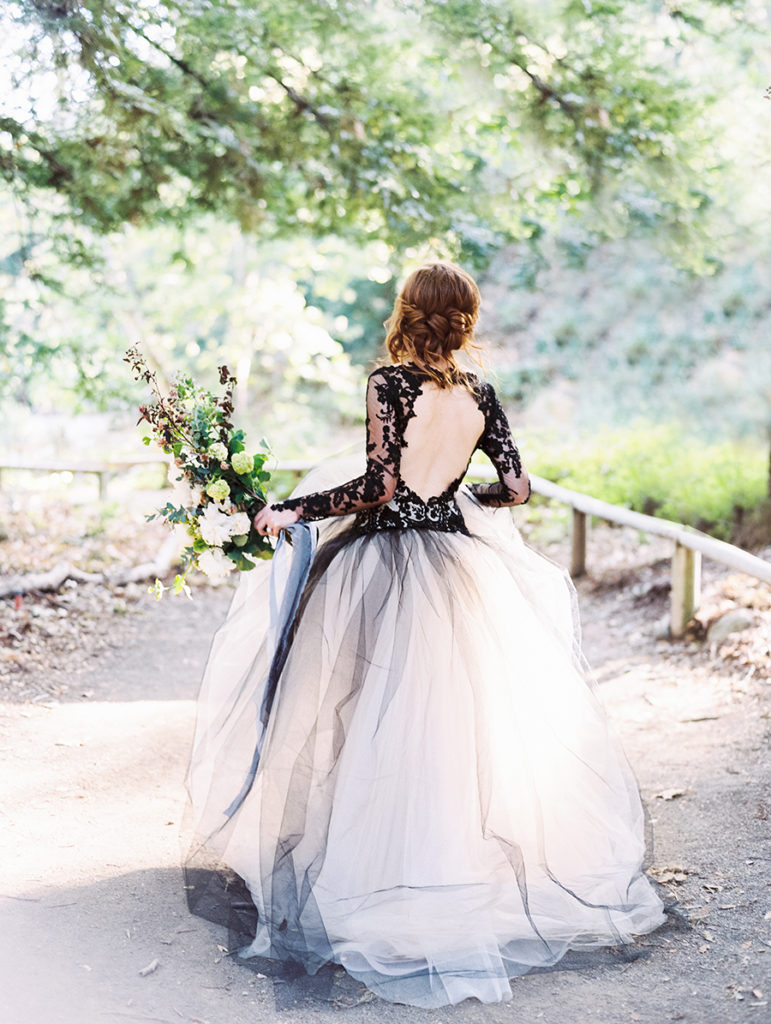 This black and white lace wedding dress is AMAZING. Perfect for the non-traditional bride. 