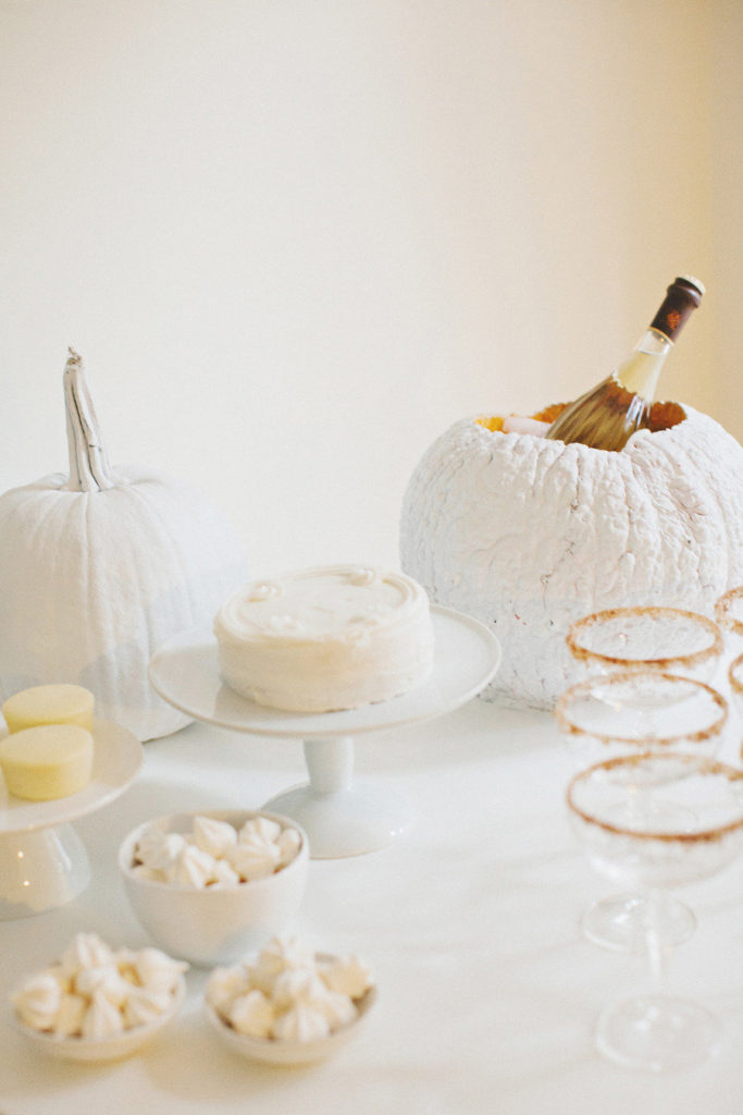 What an awesome idea! A white pumpkin ice bucket made out of a REAL pumpkin.  Major fall wedding inspo.