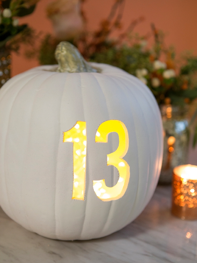 These DIY faux pumpkin table numbers are brilliant!