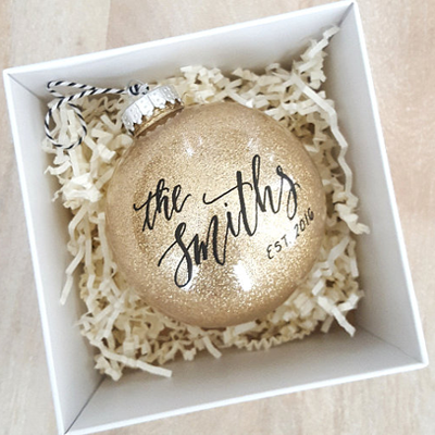 In LOVE with this gorgeous glittery gold personalized ornament! Perfect for the newlywed in your life!