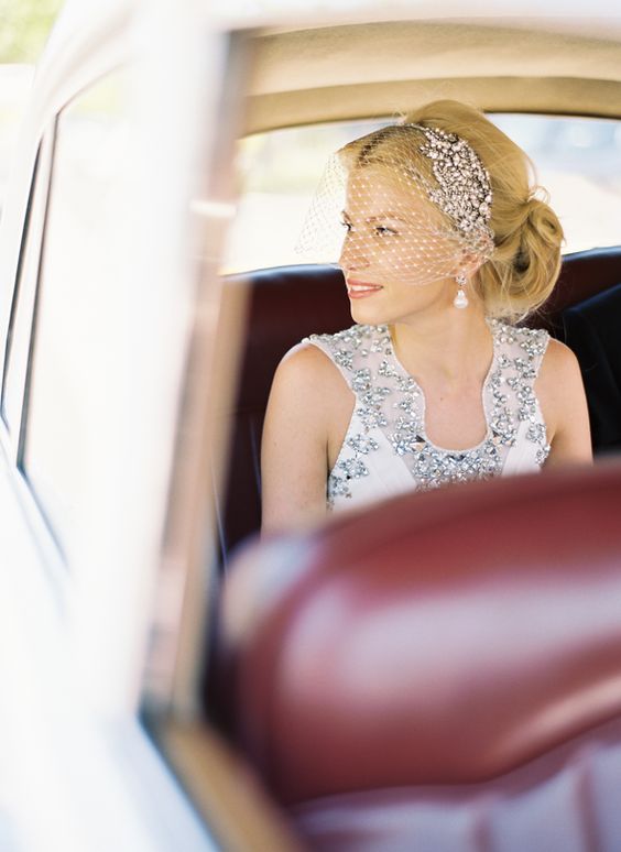 A crystal headpiece + birdcage veil is perfect for your winter wedding.