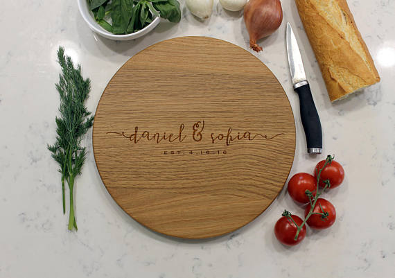 Everyone needs this gorgeous round monogrammed cutting board!