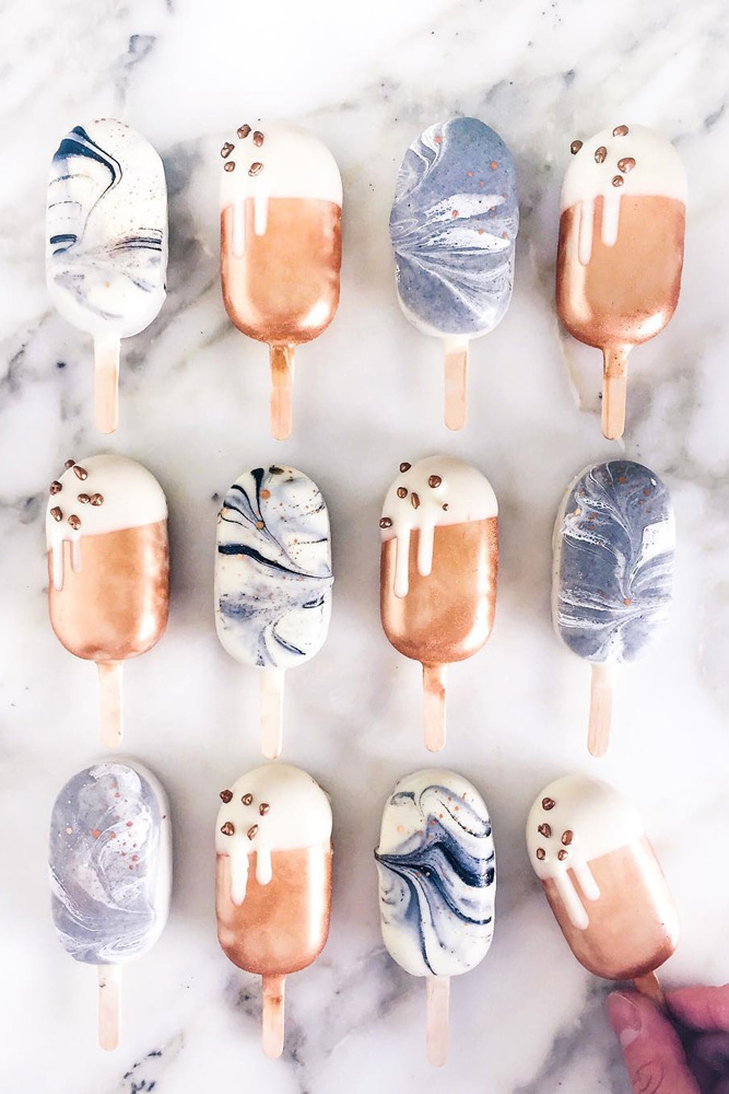 These cake pops are so pretty! I'm thinking of using them instead of a wedding cake at my wedding. Love the copper, purple, and marble.