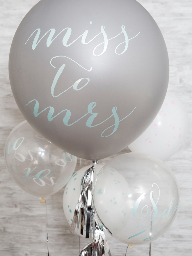 Make your own custom balloon signs using your Cricut and vinyl!