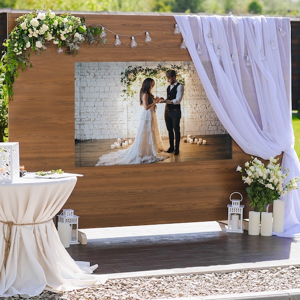 I love this instead of a wedding guest book! Get a custom canvas print made and ask guests to sign it.