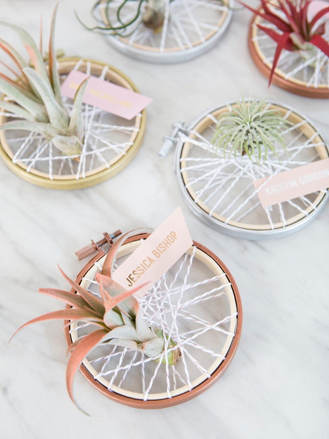 These DIY air plant favors doubled as seating cards for this baby shower!