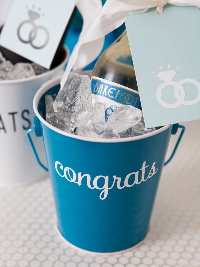 These DIY Mini-Champagne bucket engagement gifts are the cutest!