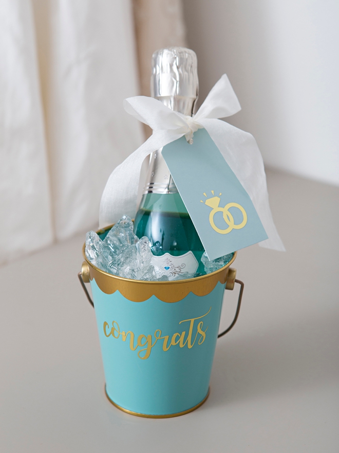 These DIY Mini-Champagne bucket engagement gifts are the best!