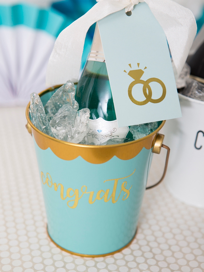 These DIY Mini-Champagne bucket engagement gifts are the cutest!