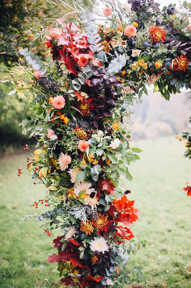 A fall floral arch is an awesome statement piece.