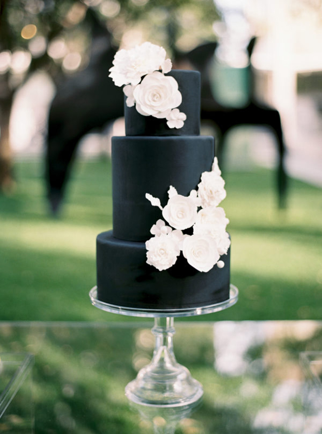 A black cake gives a sophisticated, modern vibe.