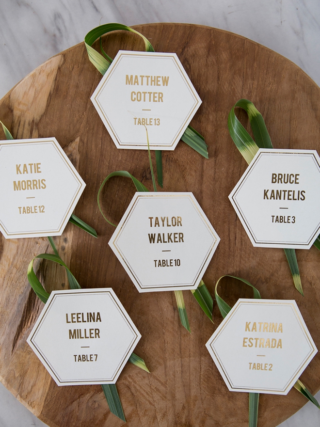 Gorgeous DIY seating and escort cards with leaves and grass!