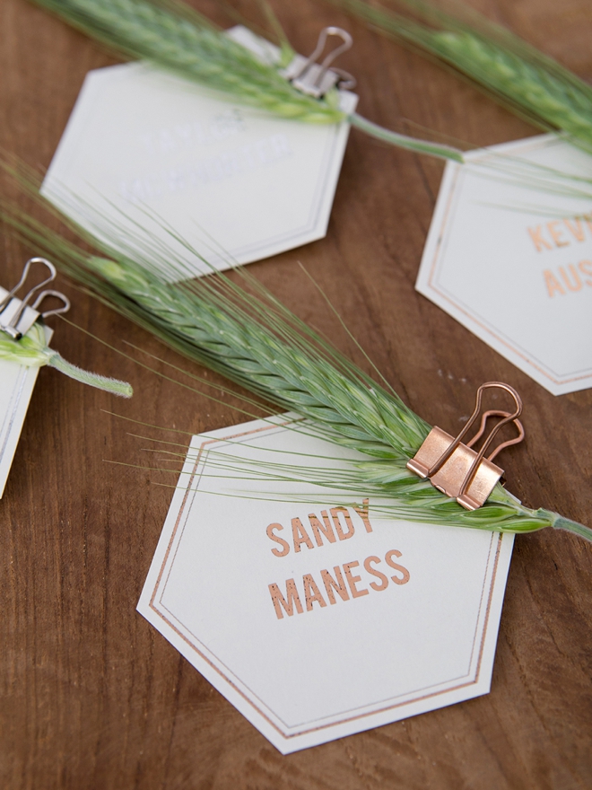 Gorgeous DIY seating and escort cards with leaves and grass!