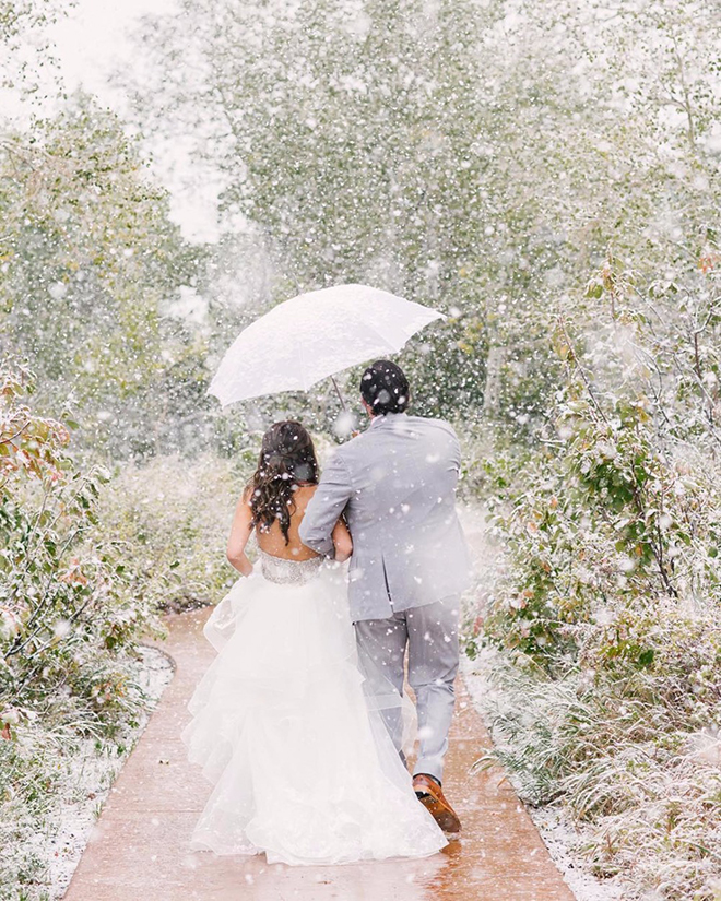 A must have winter wedding shot, snow snap.