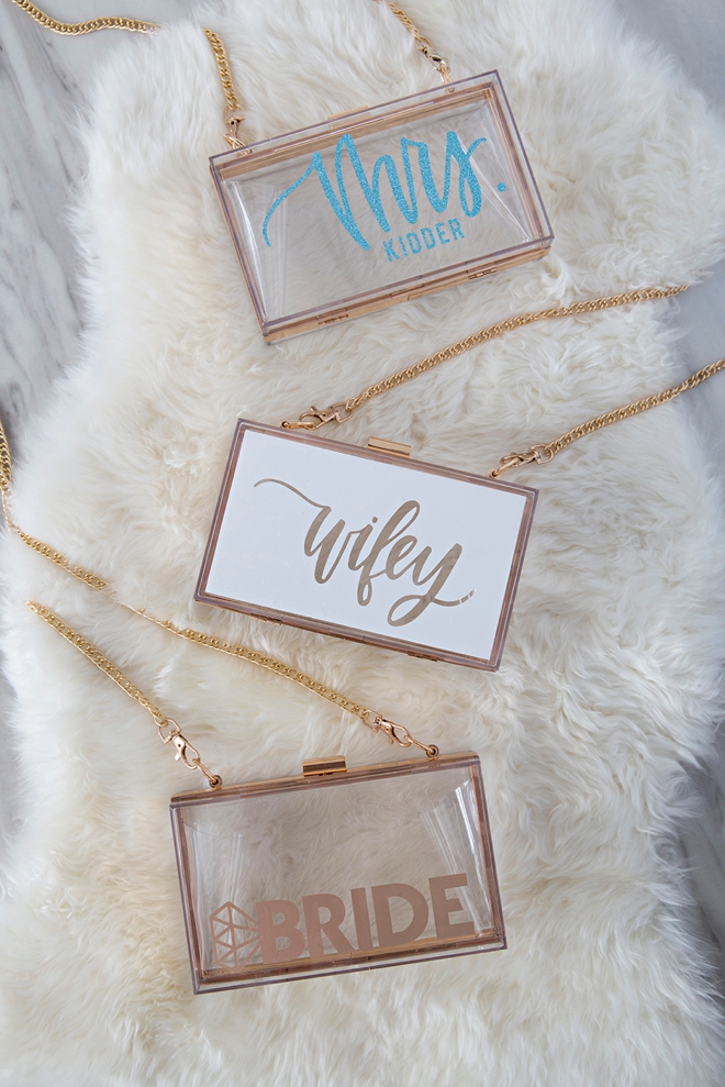These personalized clear acrylic wedding clutches are stunning!