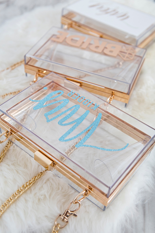 These personalized clear acrylic wedding clutches are stunning!