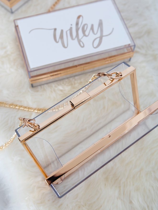 These personalized clear acrylic wedding clutches are stunning!