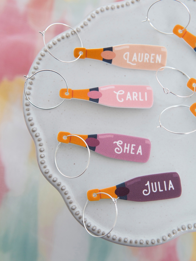 Learn how to make wine charms out of shrinky dink using your Cricut!