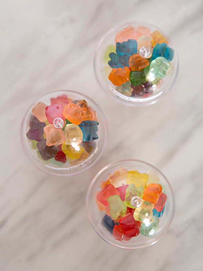 Make your own mini cake stand favors full of mini gummy bears!