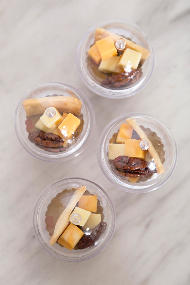 Make your own mini cheese board wedding favors, in mini cake stands!