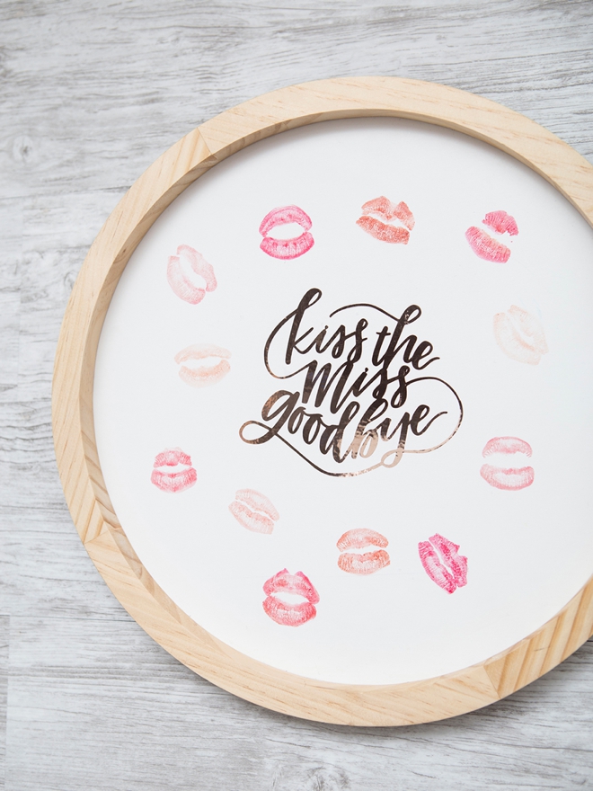This DIY kiss the miss goodbye plaque is way too cute!