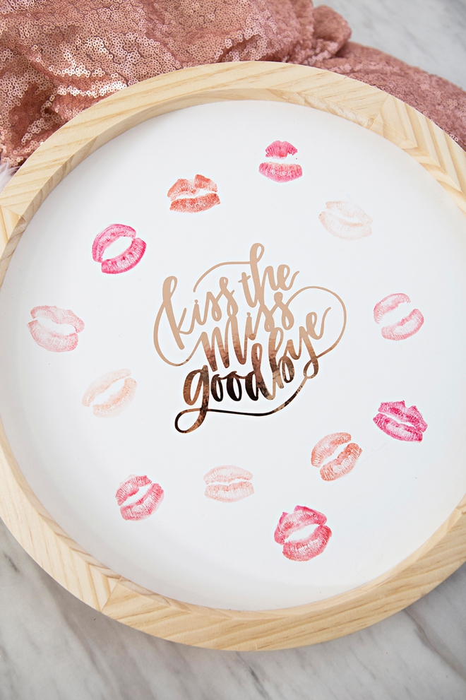 This DIY kiss the miss goodbye plaque is way too cute!