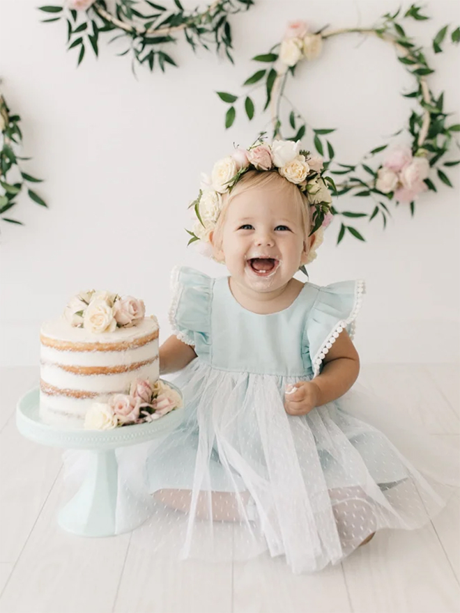 Just gorgeous naked-smash cake in beautiful blue dress!