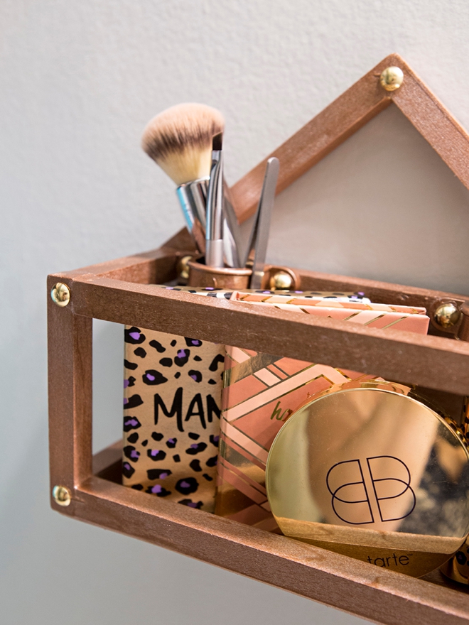 This custom DIY makeup shelf is just WAY too cute!