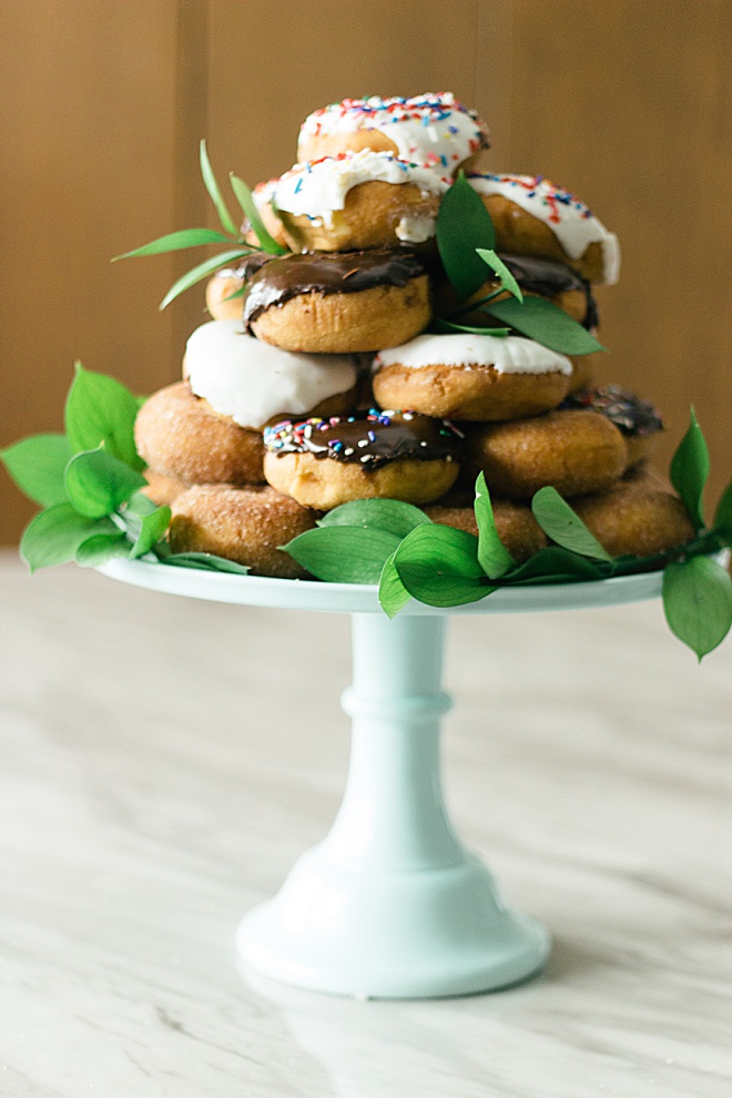 Learn how to make this simple and delicious DIY donut wedding cake!