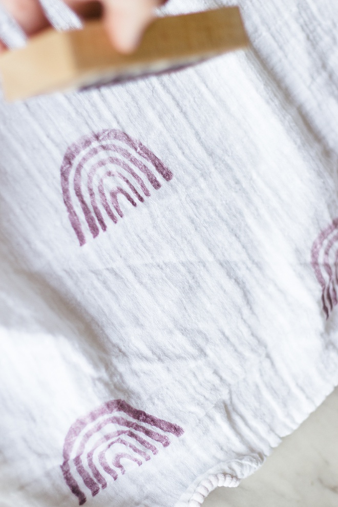 Can't get enough of these modern rainbows you see all over the internet? We are showing you how to make your own stamped muslin blanket on the blog!