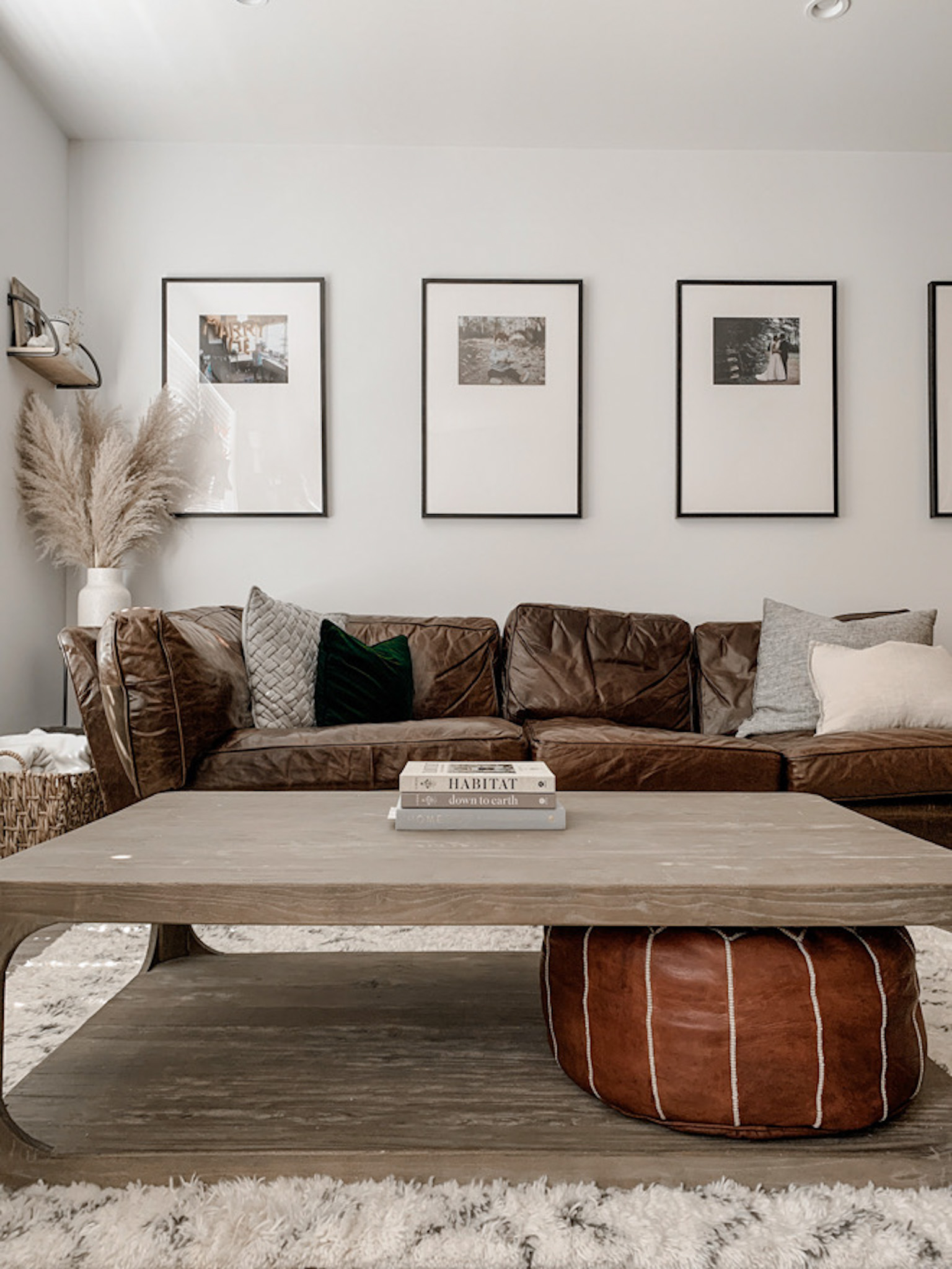 This is the most perfect minimalist, natural living room! The best part is the gallery wall with family photos. Would you believe it's a DIY?! #ikeadiy #diy #gallerywall