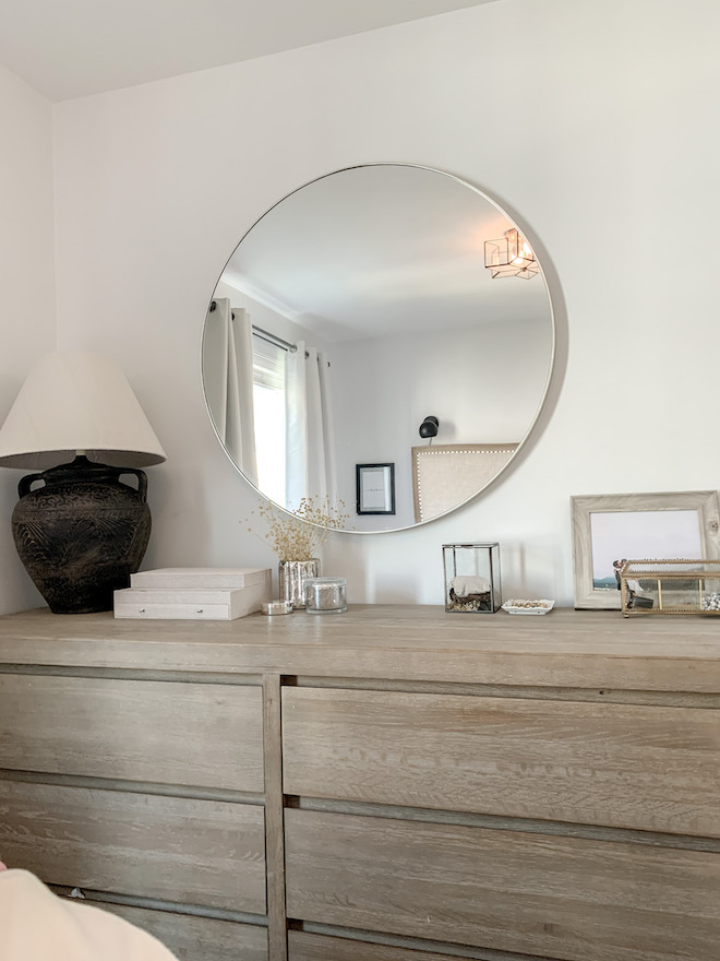 This neutral, natural, muted bedroom with an oversized black table lamp is what I need in my life! The best part? The vintage, "found" lamp is actually a DIY and you won't believe what the awful before pictures looked like. #inspo #bedroom #maker #transformation