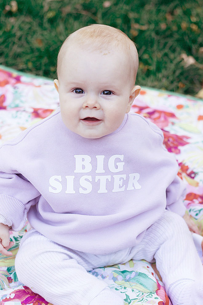 We have the cutest pregnancy announcement sweatshirt for you to DIY with Cricut on the blog!
